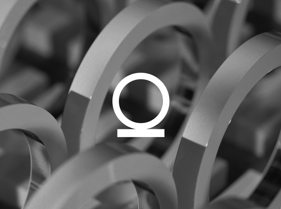 Creative Circle award logo in white over a close-up 3D render of grey metal rings.