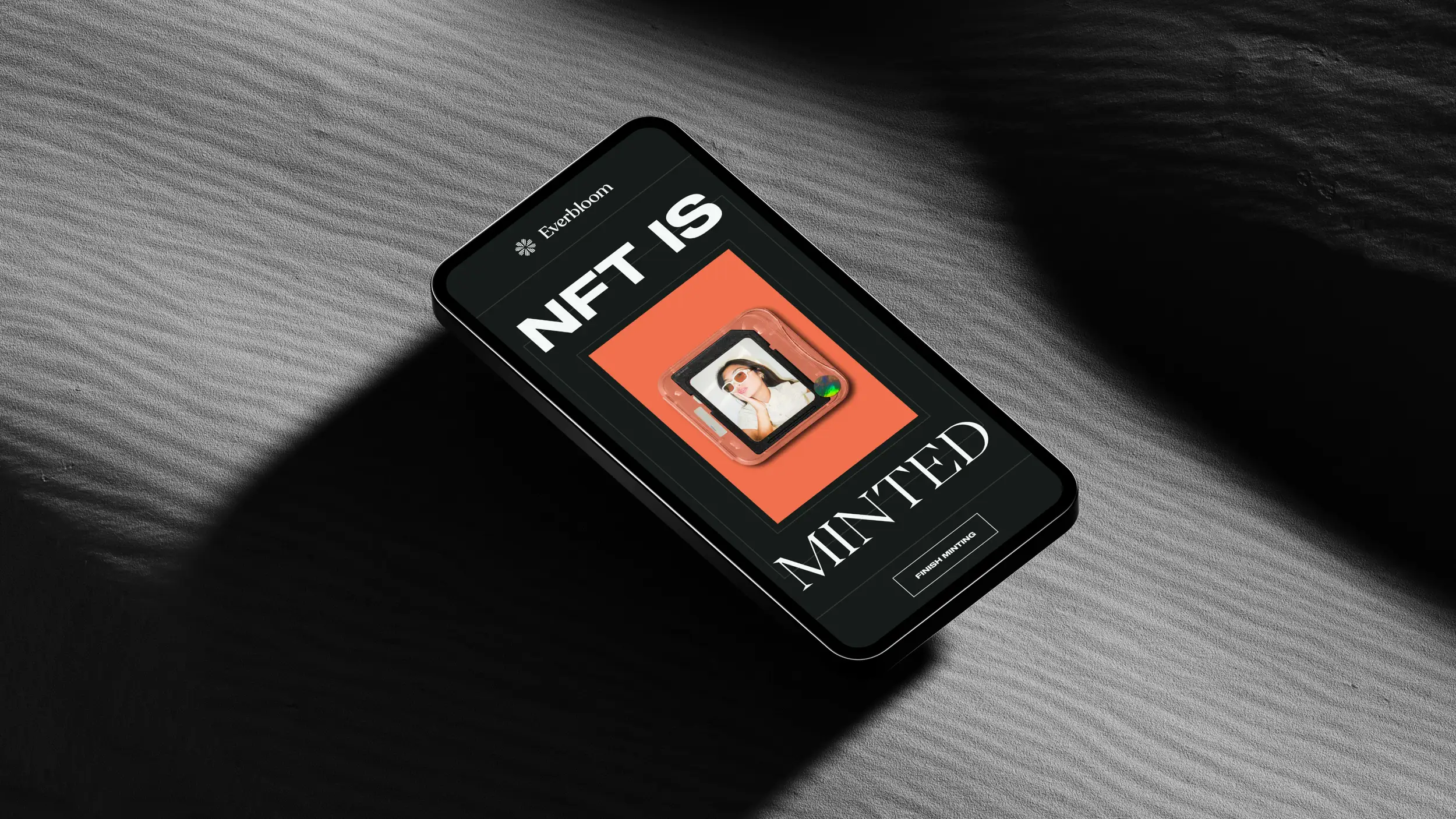 Image of a floating phone with a title saying NFT IS MINTED