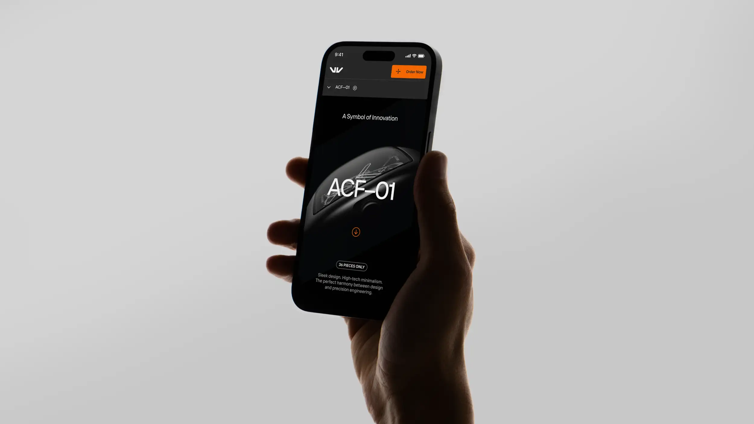 A hand holds up a smartphone against a plain light gray background, displaying a sleek, dark-themed product website for a limited-edition item called "ACF-01." The status bar reads 9:41. The top navigation shows an angular white "W"-style logo on the left and an orange "+ Order Now" button on the right, with a "ACF-01" label bar below. The hero screen, on a black background, reads "A Symbol of Innovation" above the large white product name "ACF-01" overlaid on a dark, glossy render of the sculptural product. Below, an orange down-arrow scroll button, a "36 PIECES ONLY" pill badge, and body text reading "Sleek design. High-tech minimalism. The perfect harmony between design and precision engineering."
