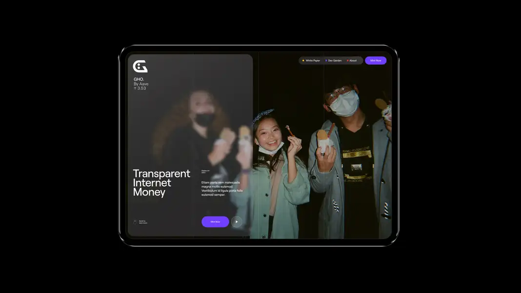 A tablet in landscape orientation floating against a pure black background, displaying the GHO website homepage in dark mode. In the top-right, a pill navigation bar lists "White Paper," "Dev Garden," and "About" (each with a colored dot), plus a purple "Mint Now" button. The left half of the screen shows the "G" face logo with "GHO. By Aave ↑ 3.53" and the large headline "Transparent Internet Money," accompanied by placeholder body text, a purple "Mint Now" button, a play button, and a "Scroll to learn more" prompt in the corner. The right half is a warm-toned nighttime photo of two smiling young people in casual jackets, wearing face masks pulled down or on, holding street-food ice cream or crepe cones.