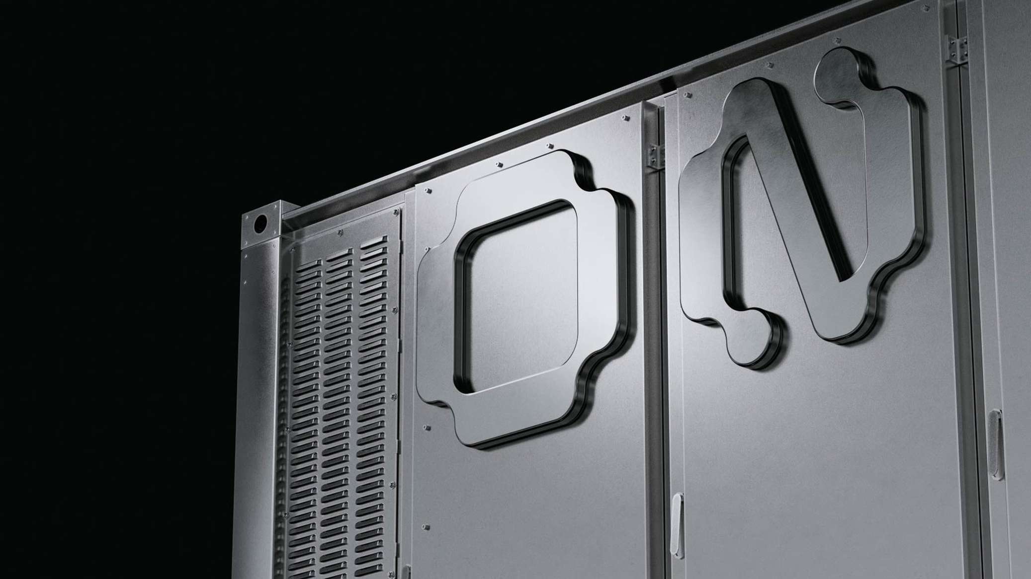 Close-up angled photo of a gray metal industrial enclosure with the 'ON' logo cut into the panel in raised relief, alongside ventilation slats and visible screws, against a black background.